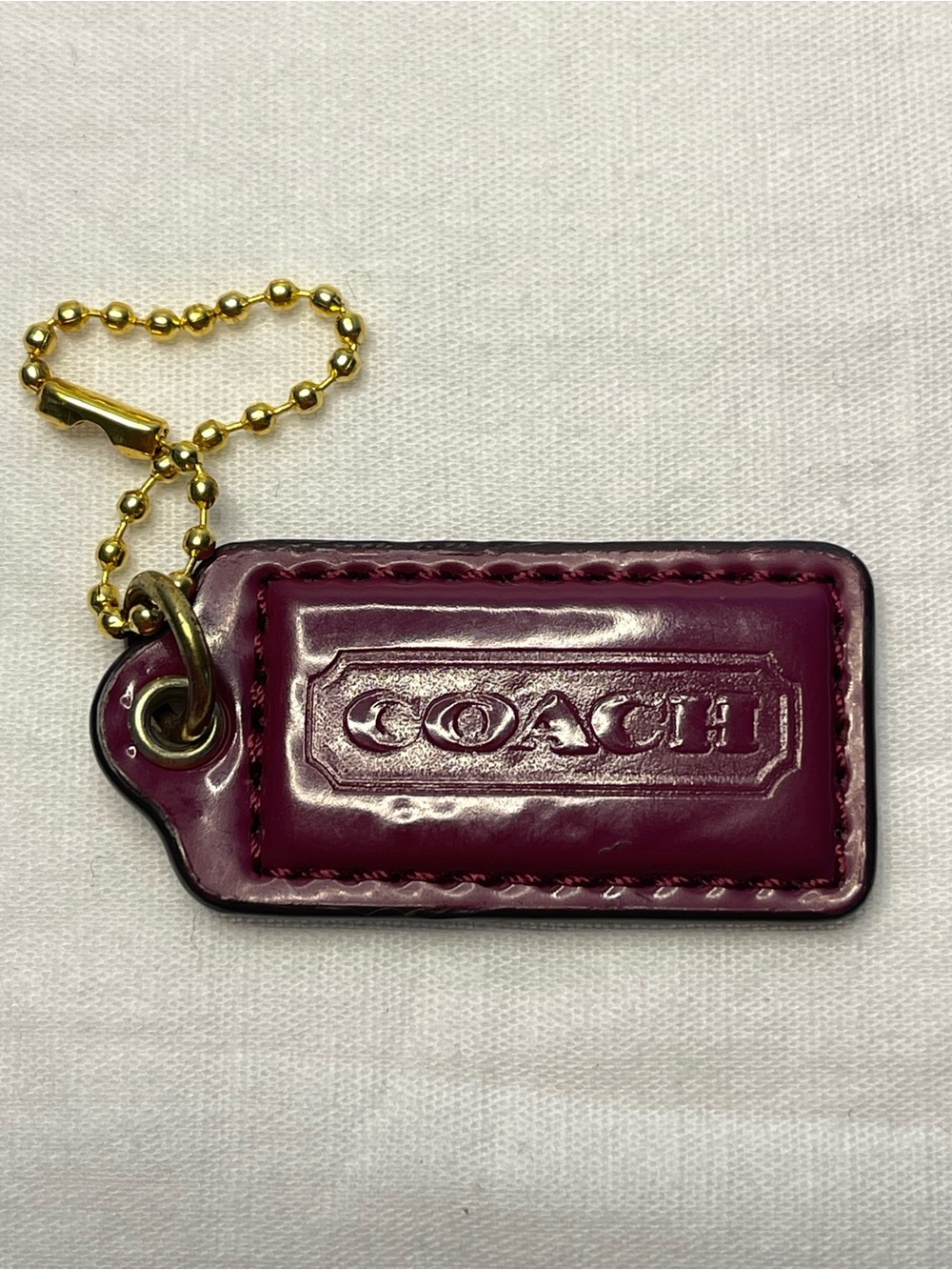Coach Burgundy Leather Hang Tag with Gold Chain